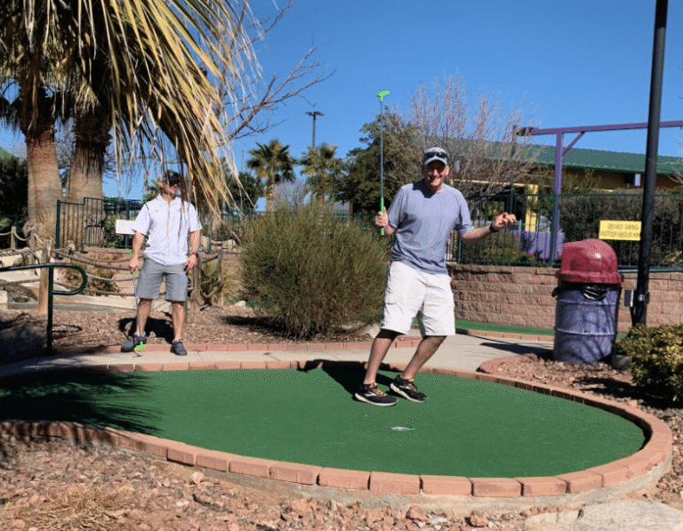 Family Enjoying a game of mini golf
